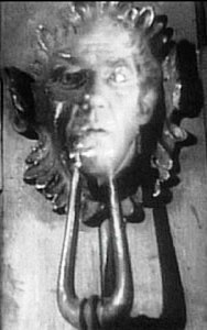 Marley's face on the doorkncoker in A Christmas Carol.