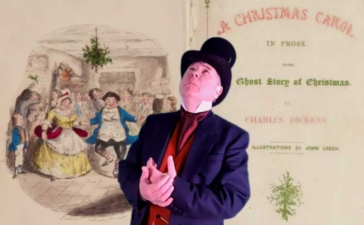 Richard in his Victorian outfit with the frontpiece of A Christmas Carol behind him.