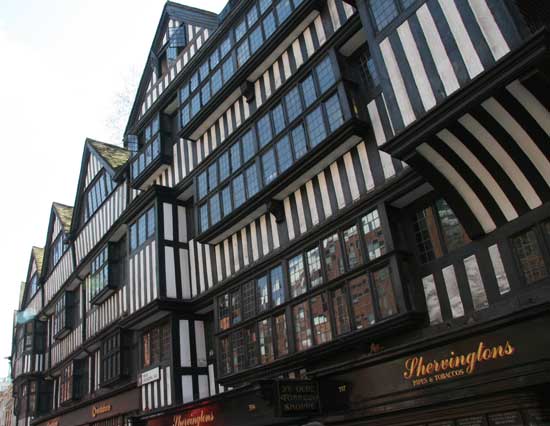 The black and white timbered facade of Staple Inn.