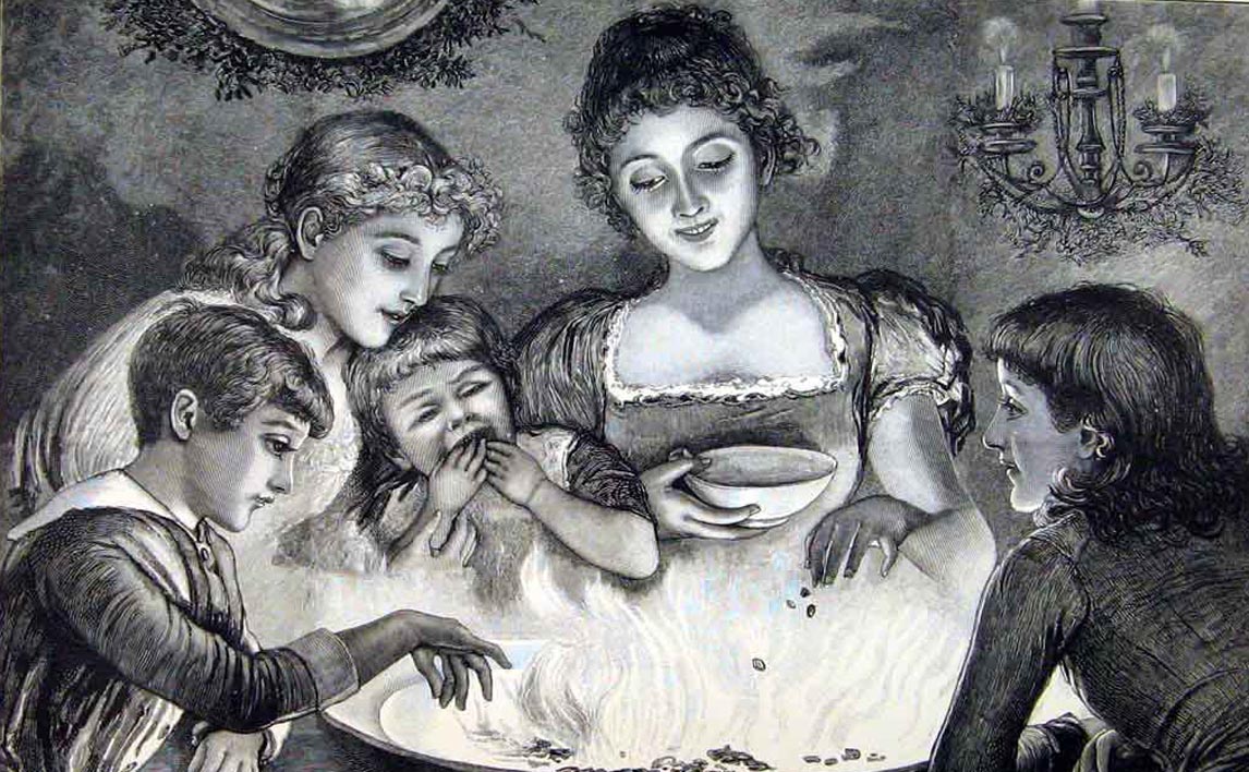 A family playing the old Victorian Parlour game of Snap-Dragon